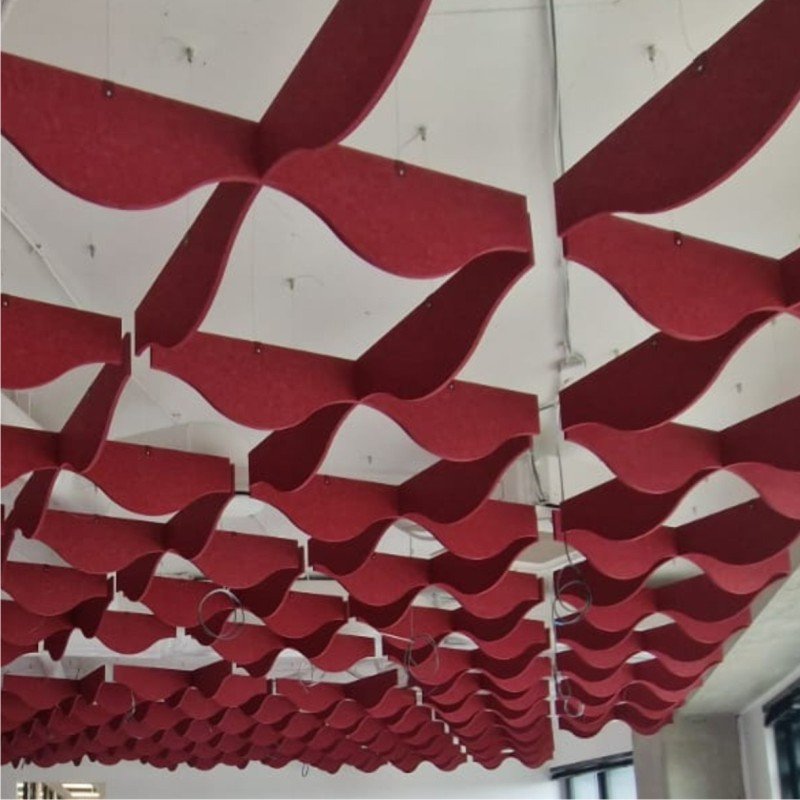 Acoustic ceiling baffles WAVES in a modern commercial interior